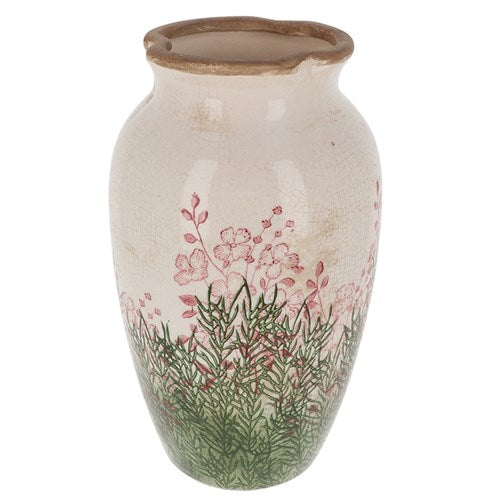Ceramic vase with floral design on a white background