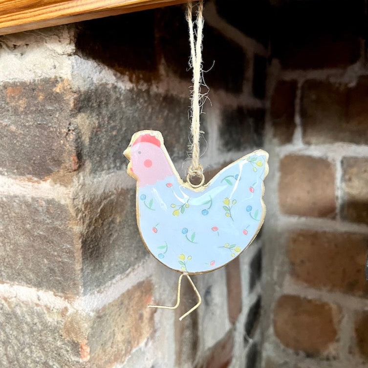 Metal Chicken with Pink Face Hanger from Distance