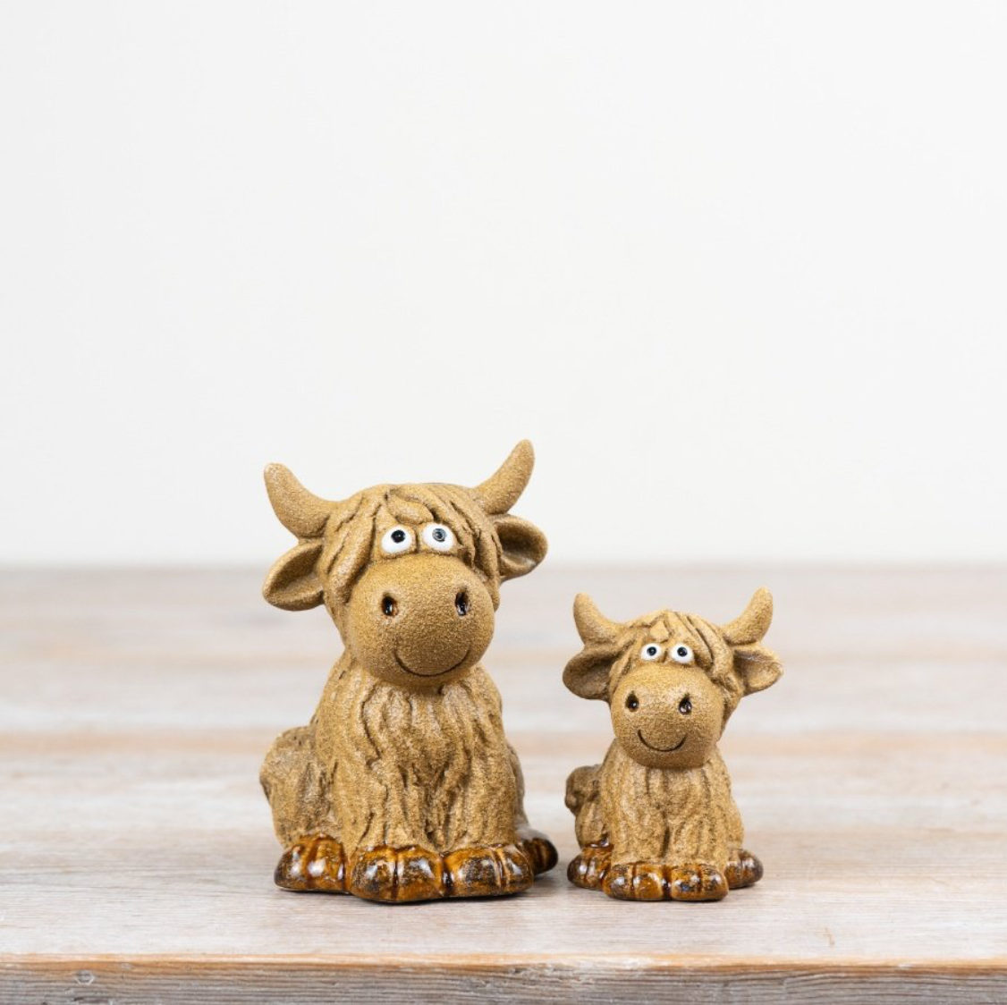 Stoneware Sitting Highland Cow
