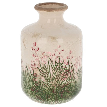 Decorative bottle vase with floral design on a white background