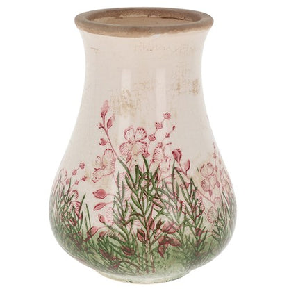 Ceramic vase with floral design on a white background