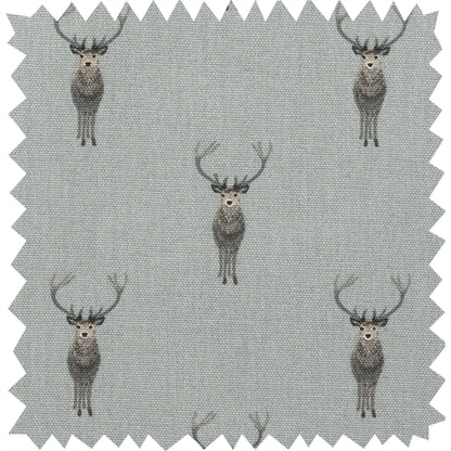 A square fabric swatch with zigzag-cut edges, featuring a repeating pattern of grey and brown deer on a light grey background.
