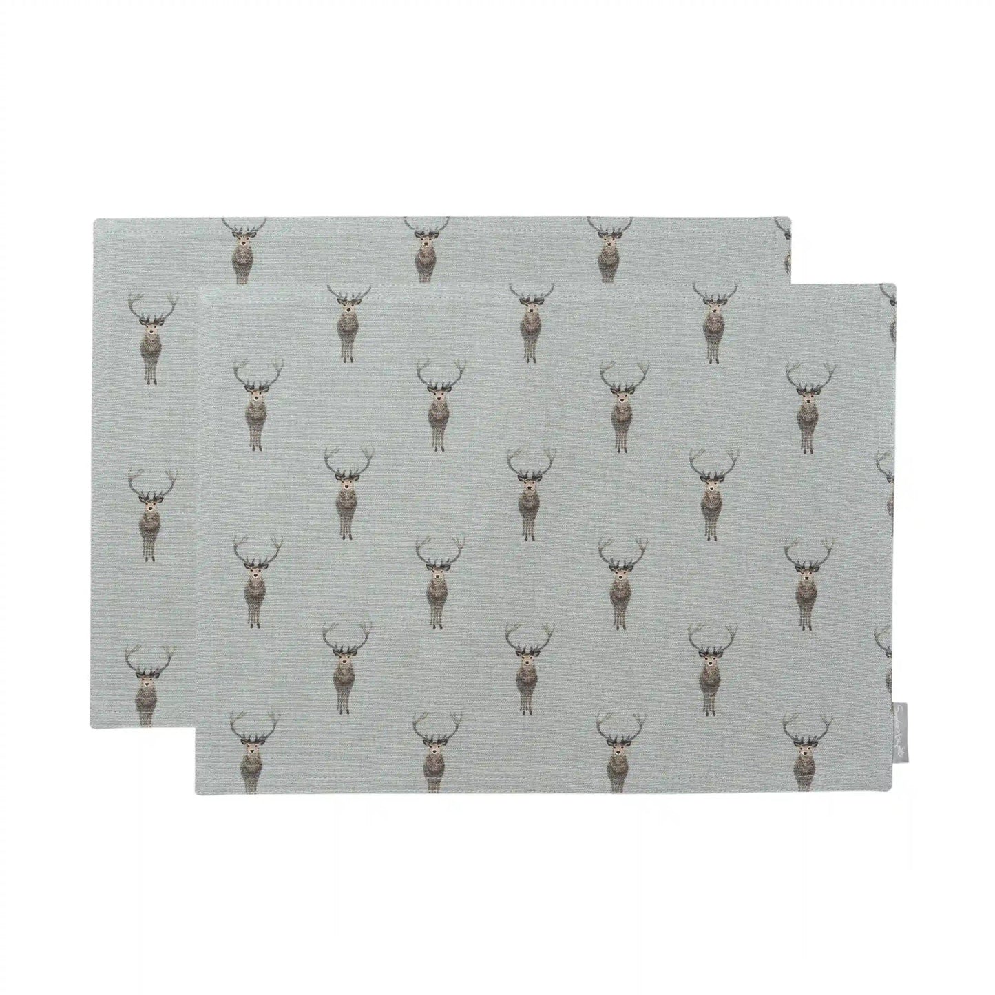 Two rectangular placemats with a repeating deer print on a light gray background, shown overlapping on a white studio background.