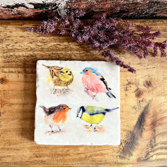 Image of a square marble coaster with watercolour painted popular bright garden birds.