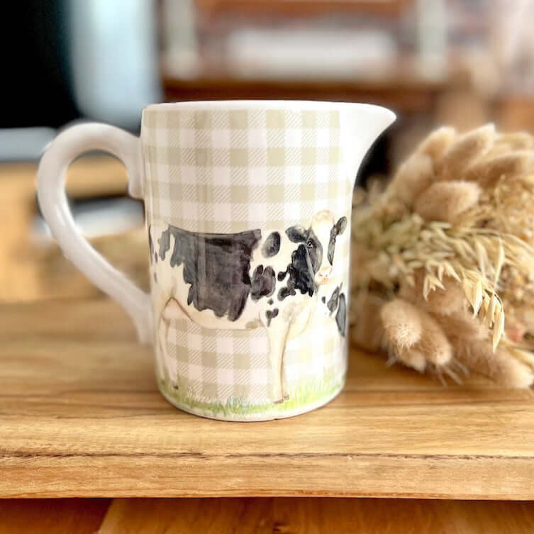 Ceramic Farmyard Jug Showing Cows on Shelf Display