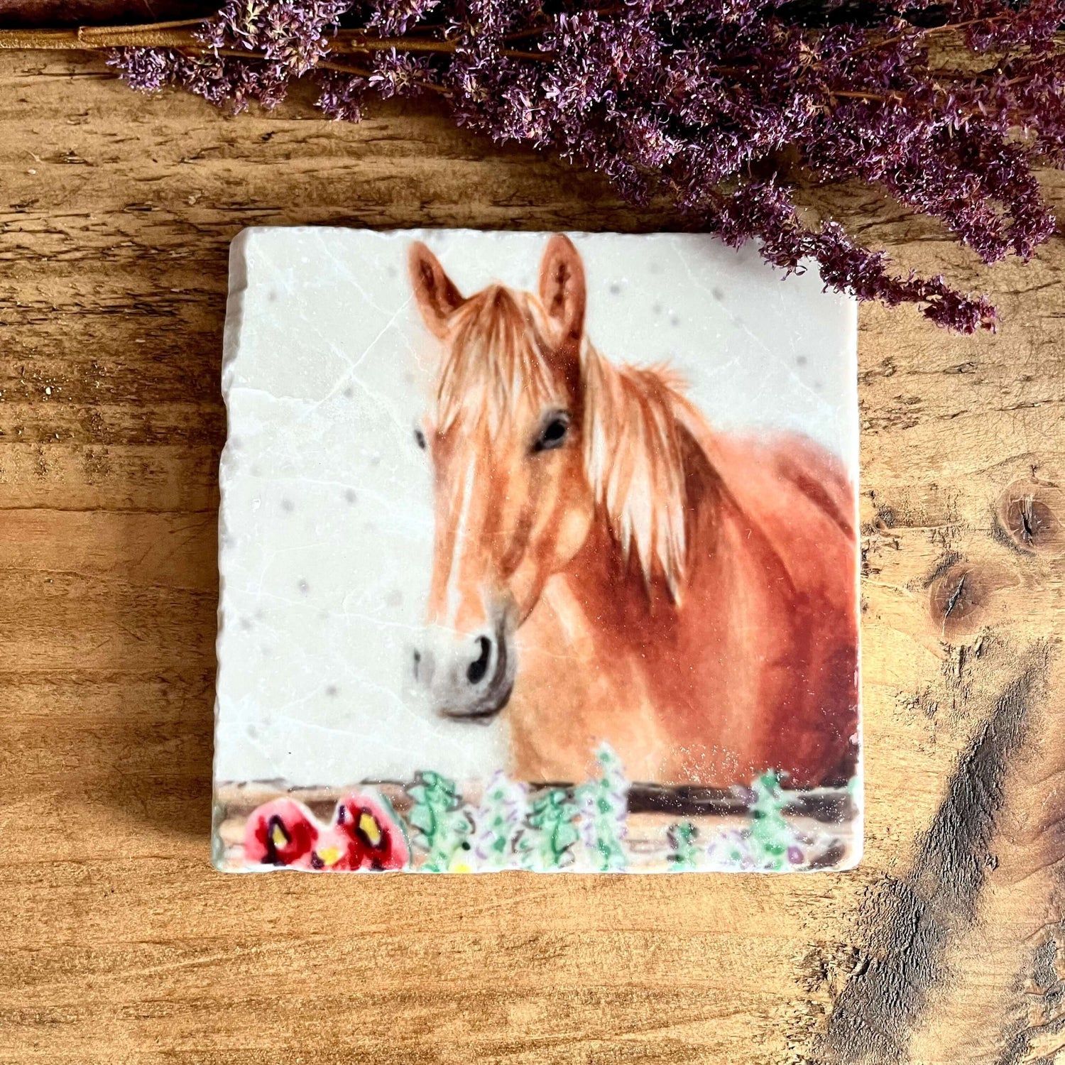 Image of a square marble coaster with watercolour painted horse in wildflowers.