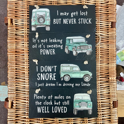 Wicker basket with 4 slate plaques featuring Land Rover illustrations and text.