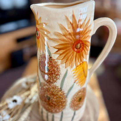 Ceramic vase jug with sunflower design with a home background