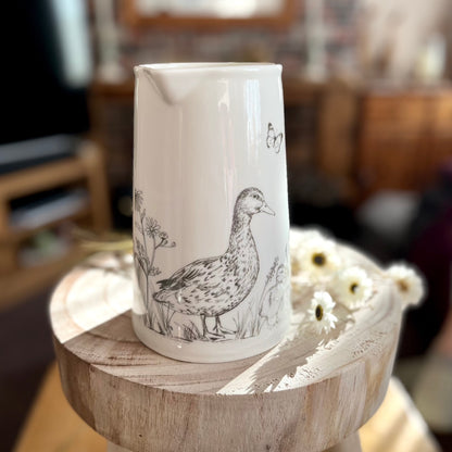 Front Jug Display of Sketched Duck & Butterfly