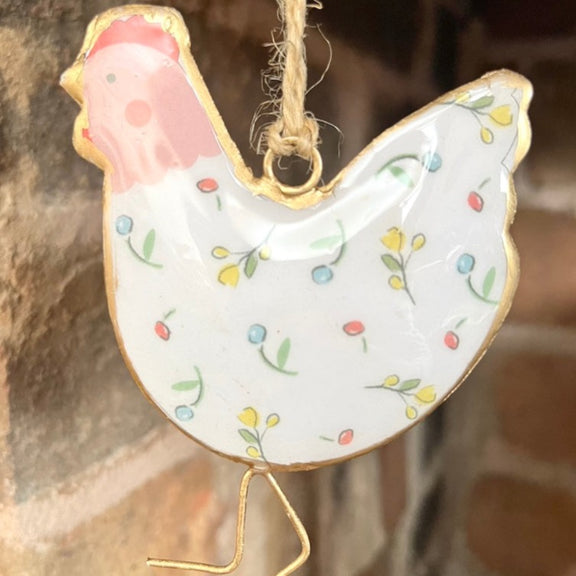 Close Up of Pink Face Hen Hanger with Brickwork Background