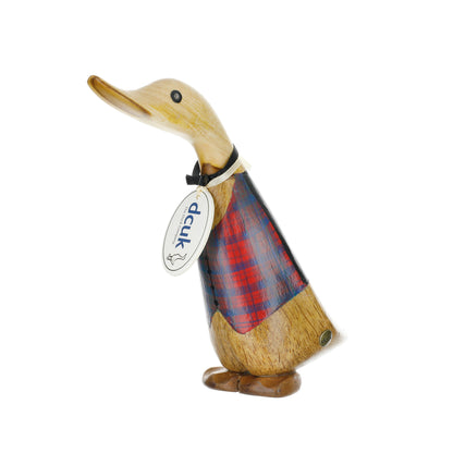 Wooden duck figurine wearing a plaid coat with a visible tag on a white background