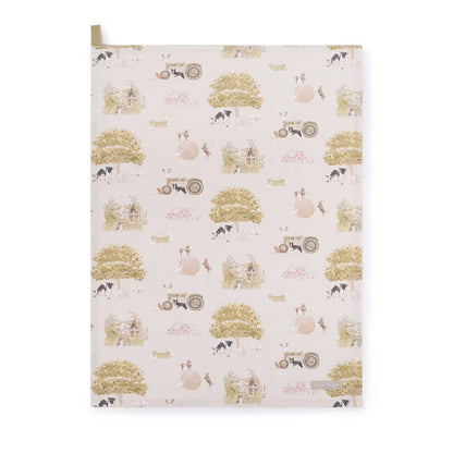 Patterned tea towel with vintage tractors, farm animals, and trees on a white background